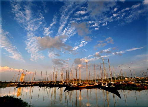 周明清《云霞映海湾》13888386372